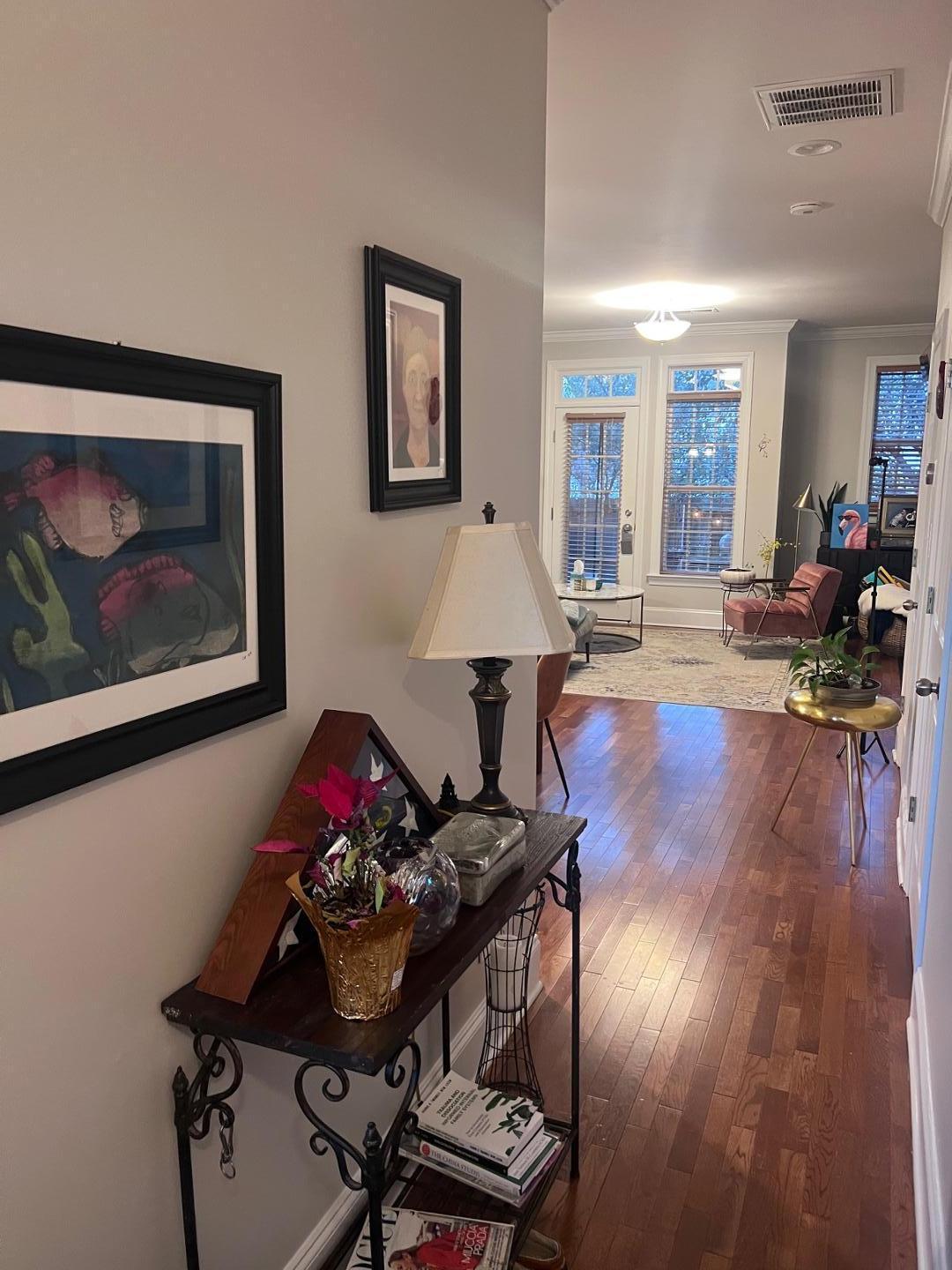 655 Highpark Lane Raleigh, NC 27608 - Photo 8 of 12 a living room with furniture and wooden floor