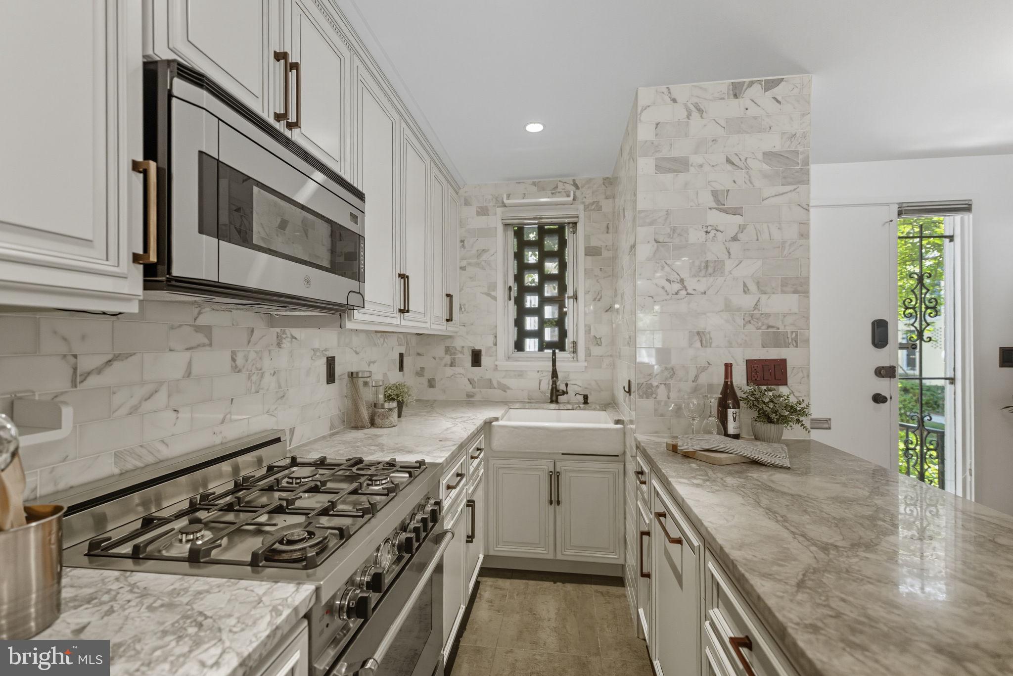 237 G Street Southwest, Unit 120 Washington, DC 20024 - Photo 7 of 31 A beautifully renovated kitchen with...