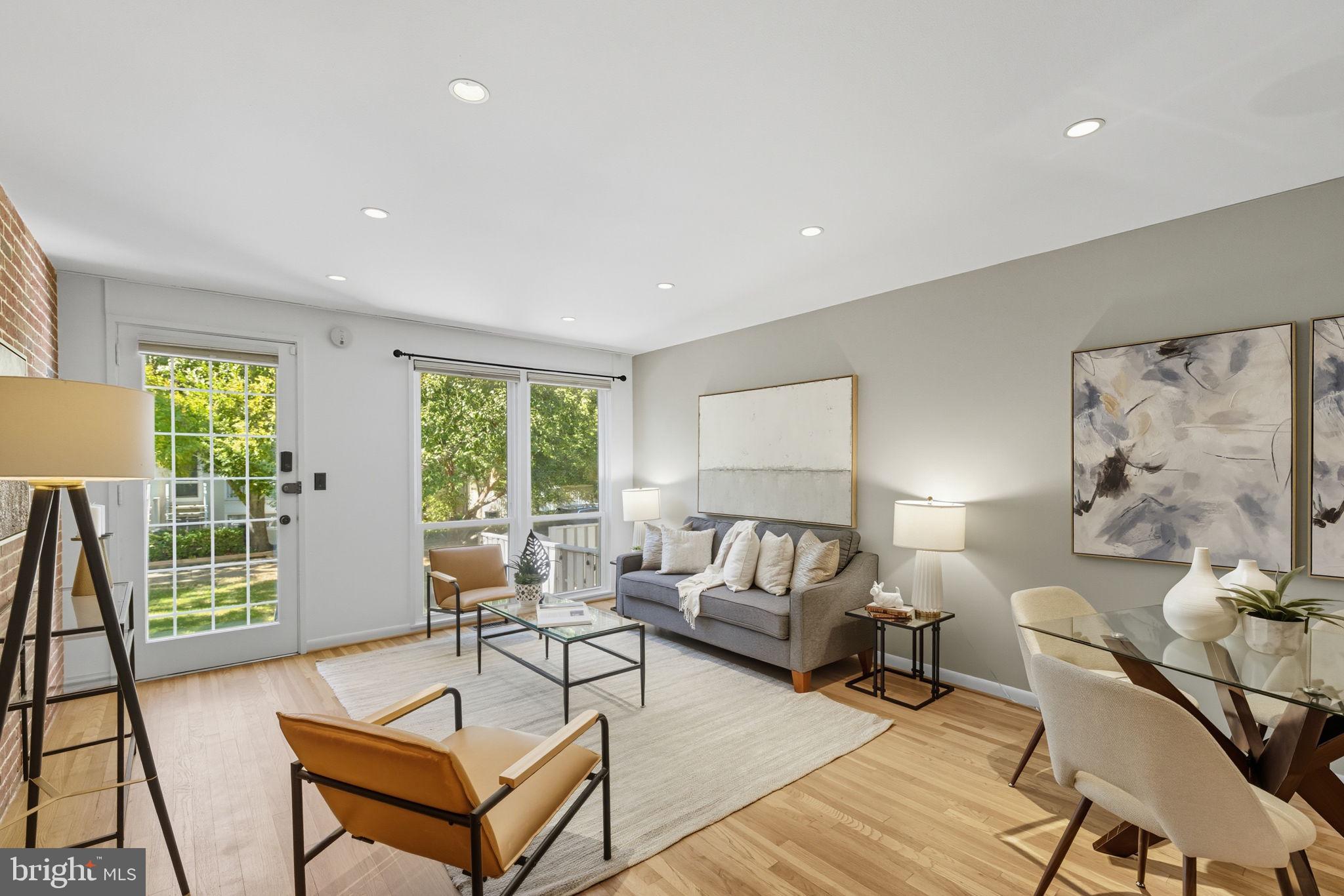 237 G Street Southwest, Unit 120 Washington, DC 20024 - Photo 10 of 31 Floor to Ceiling windows flood the home with light