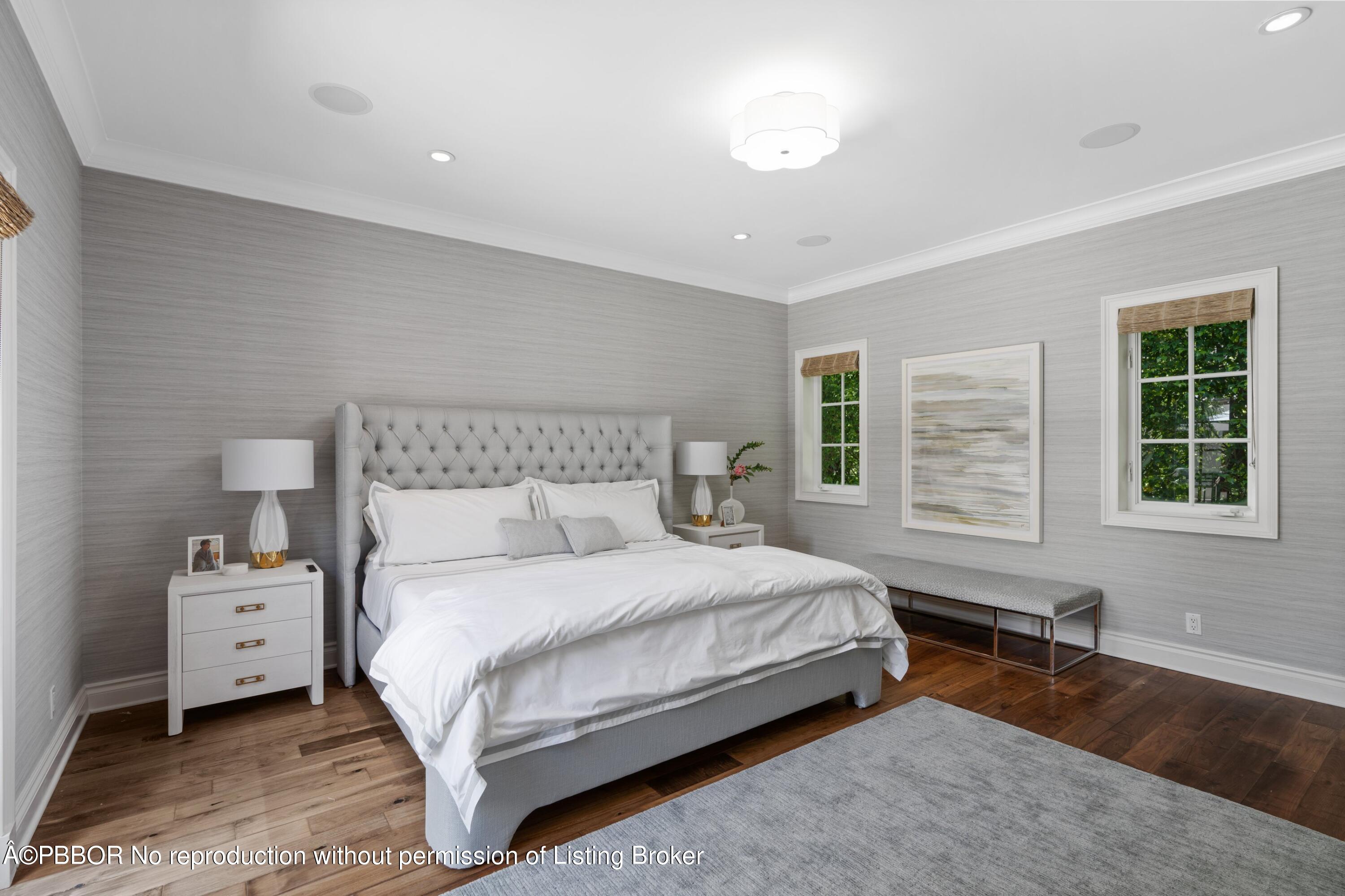 265 List Road Palm Beach, FL 33480 - Photo 13 of 26 a bedroom with a bed next to a window