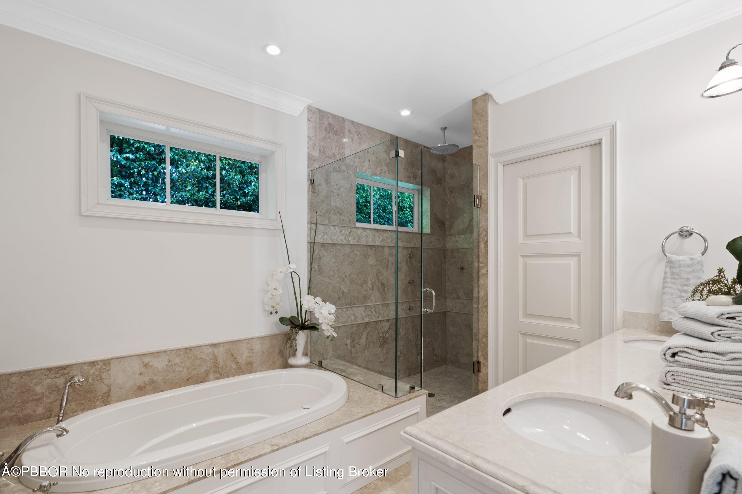 265 List Road Palm Beach, FL 33480 - Photo 15 of 26 a bathroom with a sink and a bathtub