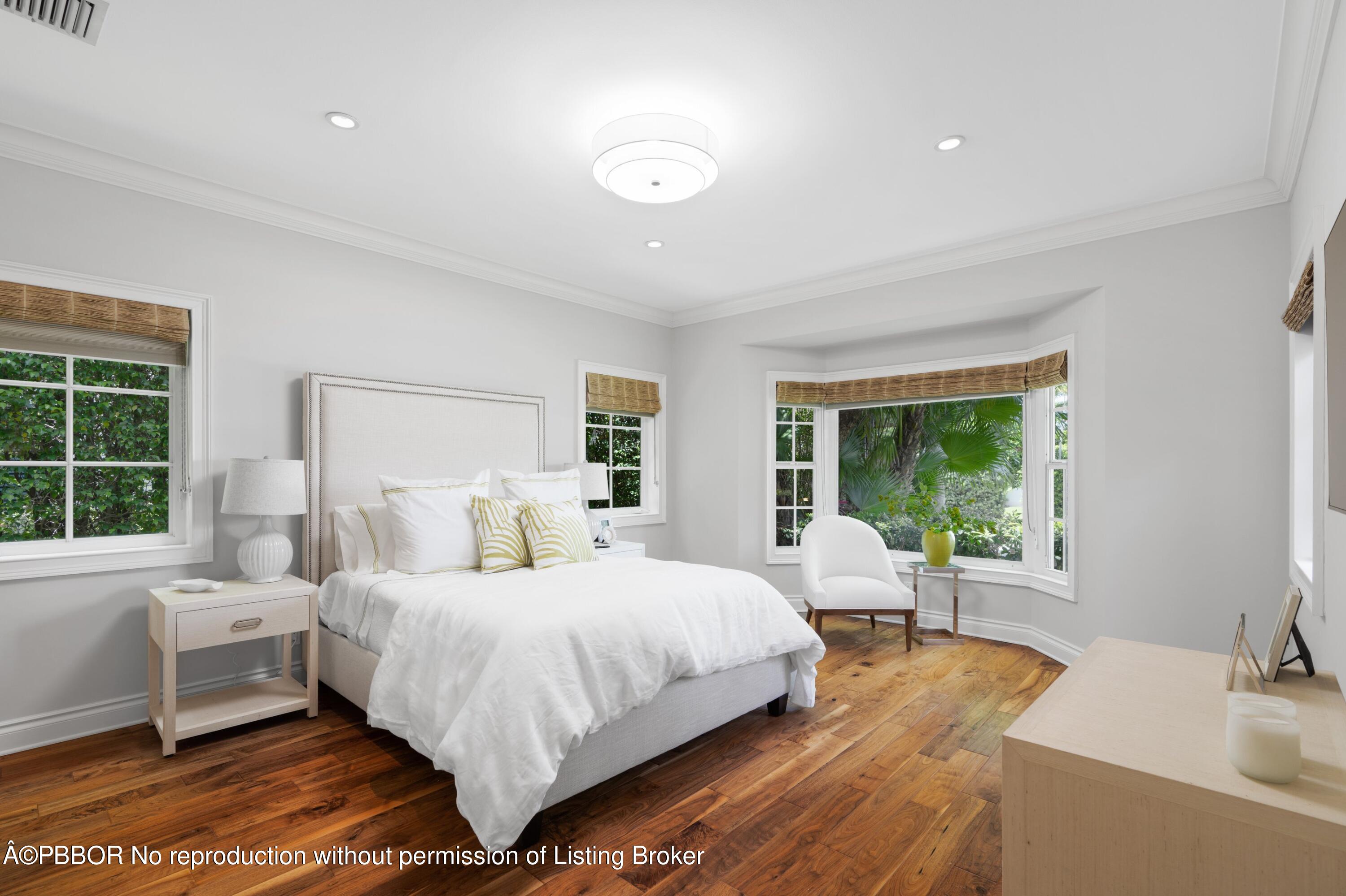 265 List Road Palm Beach, FL 33480 - Photo 19 of 26 a bedroom with a bed and a window