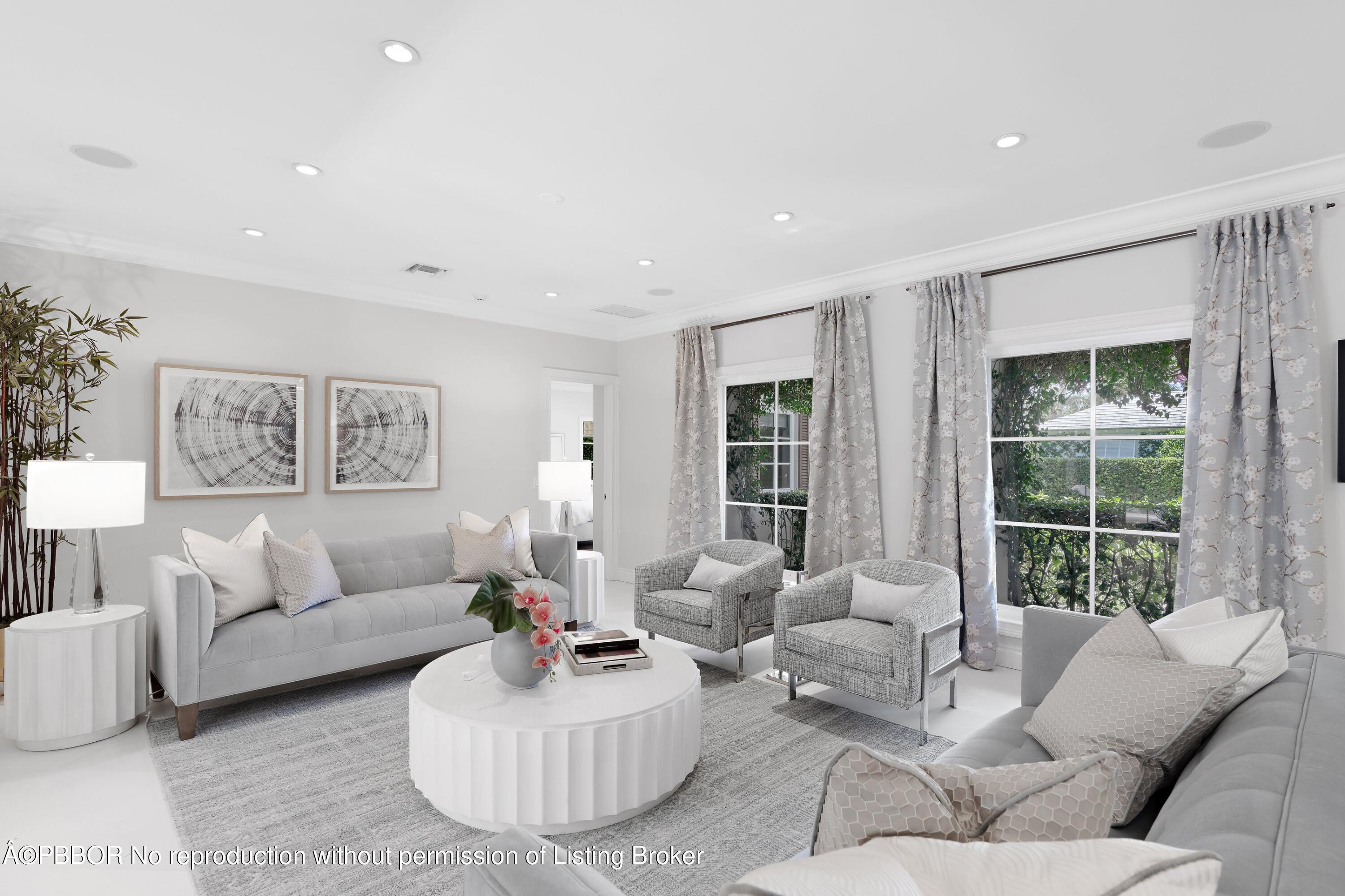 265 List Road Palm Beach, FL 33480 - Photo 6 of 26 a living room with furniture and a large window