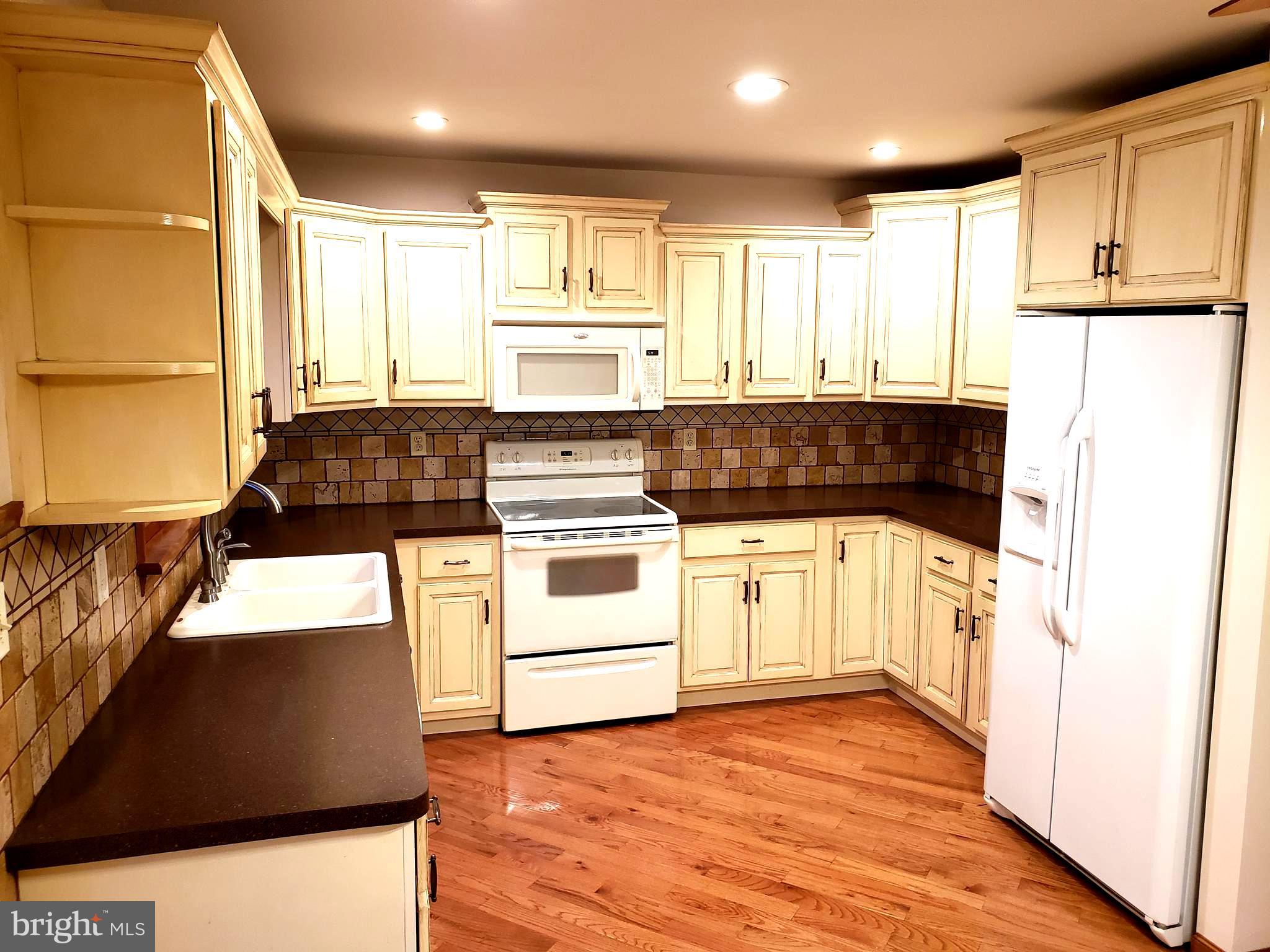450 Church Lane Road Reading, PA 19606 - Photo 6 of 16 Custom tiled splash kitchen cabinets plenty