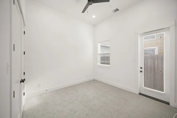 an empty room with windows
