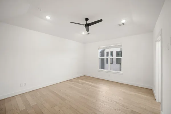 a bathroom with a toilet a sink and shower