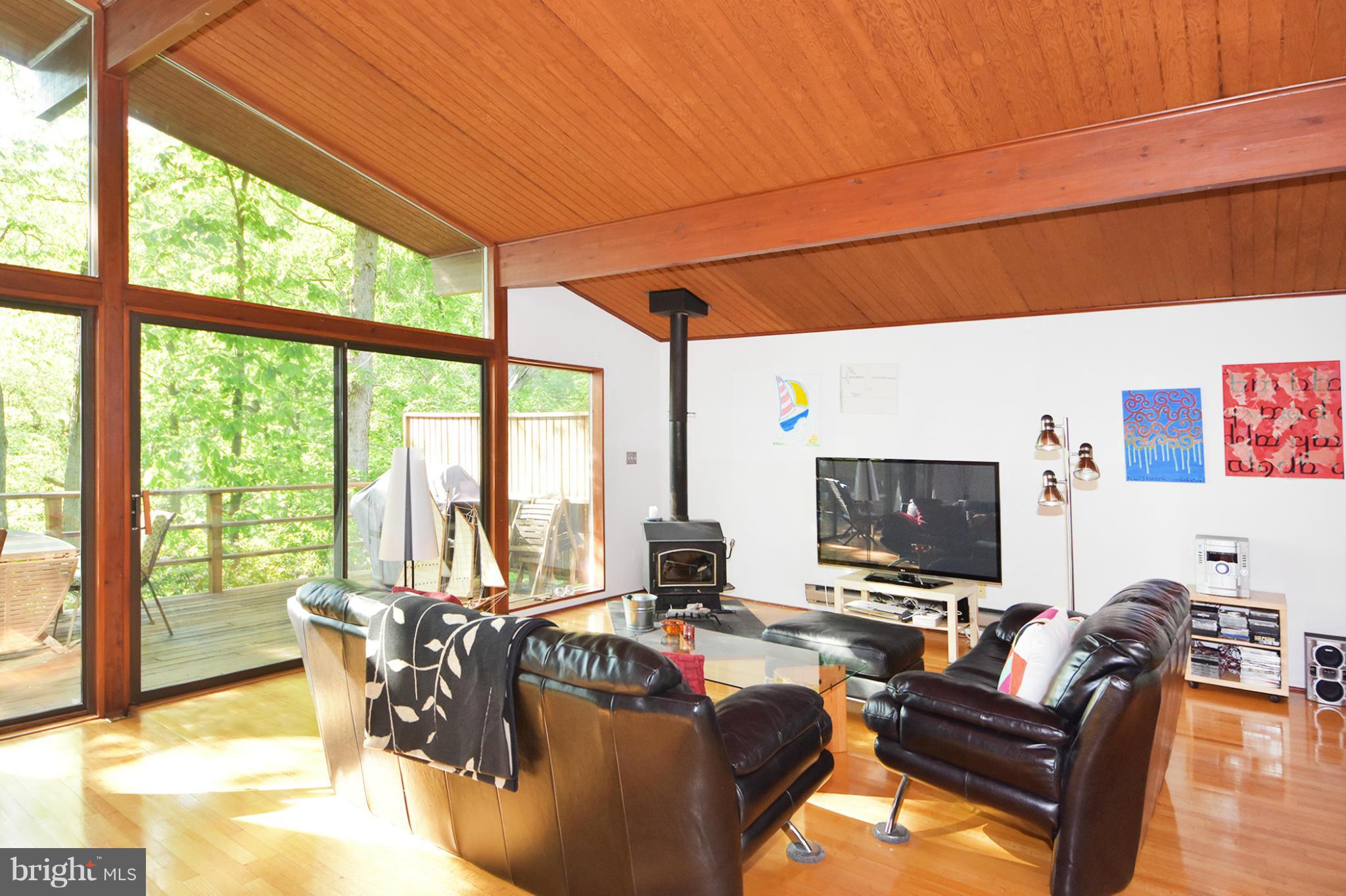 2994 Valley View Road Annapolis, MD 21401 - Photo 6 of 28 Great room has vaulted, wood paneled ceiling