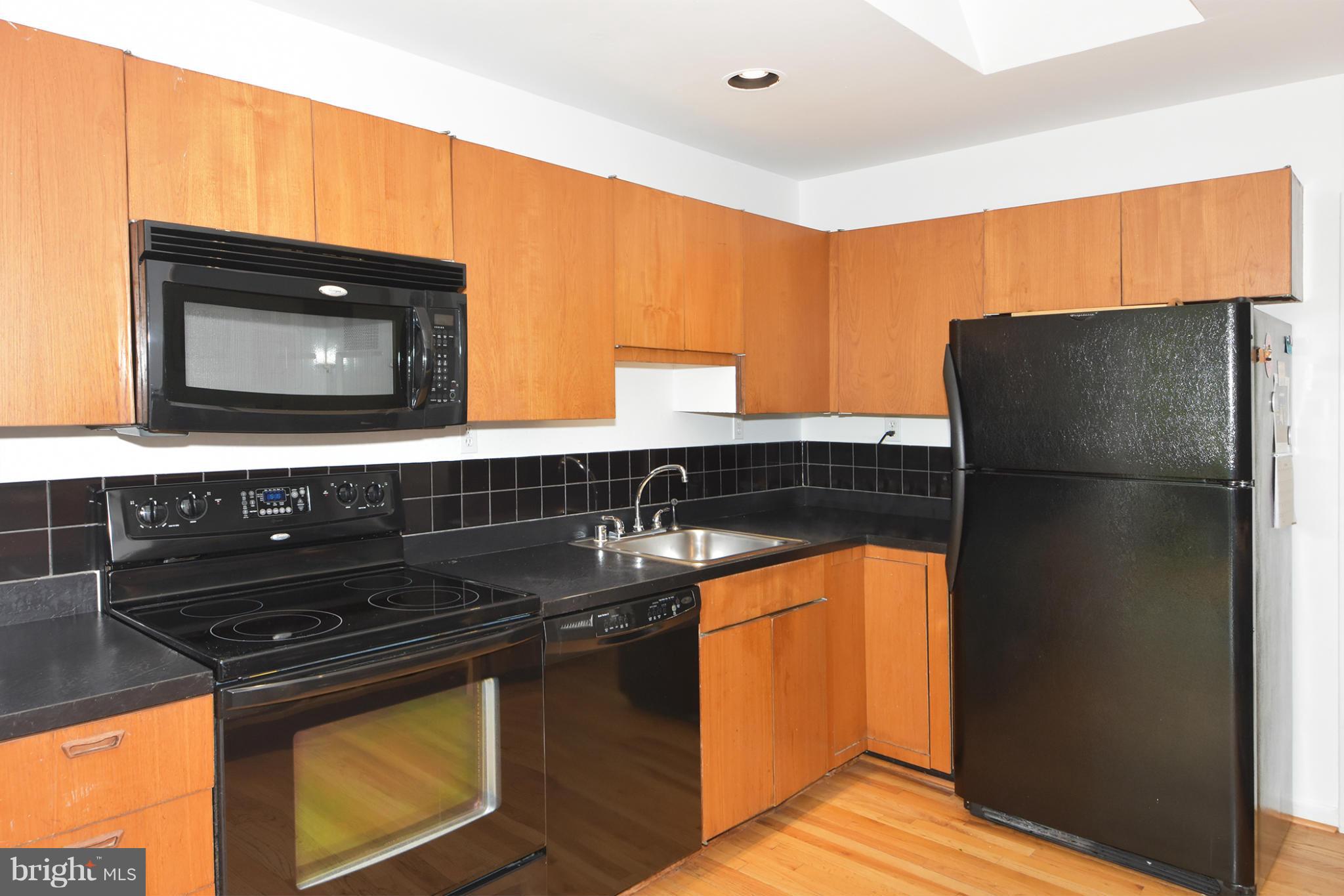 2994 Valley View Road Annapolis, MD 21401 - Photo 10 of 28 Kitchen has hardwood floors