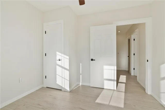 an empty room with mirror