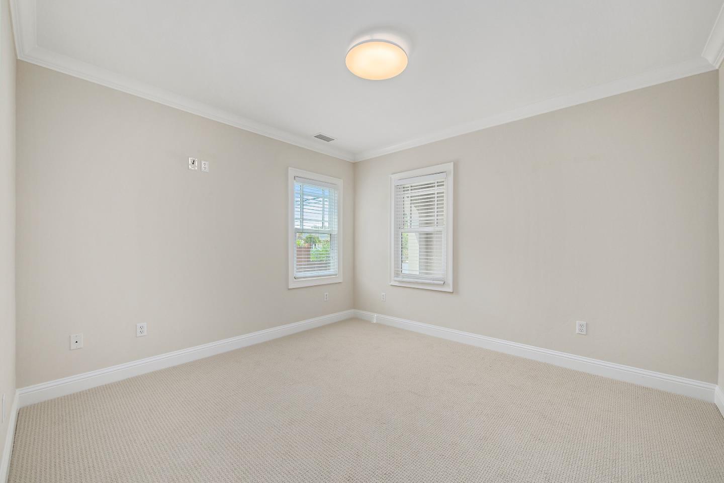 682 Second Avenue Redwood City, CA 94063 - Photo 12 of 18 wooden floor in an empty room with a window