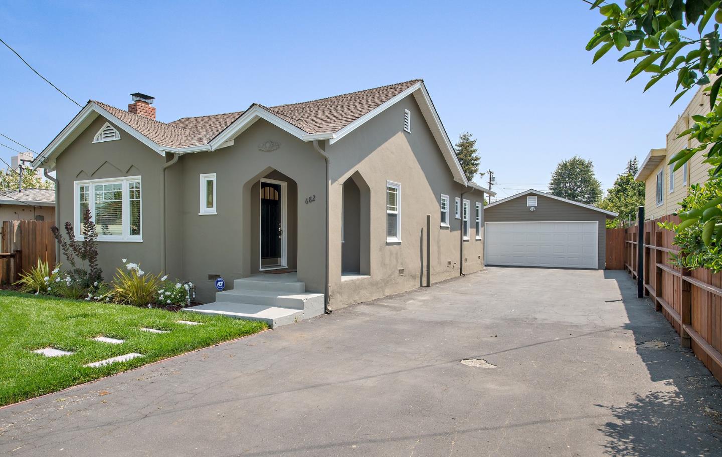 682 Second Avenue Redwood City, CA 94063 - Photo 3 of 18 a view of a house with a yard and plants