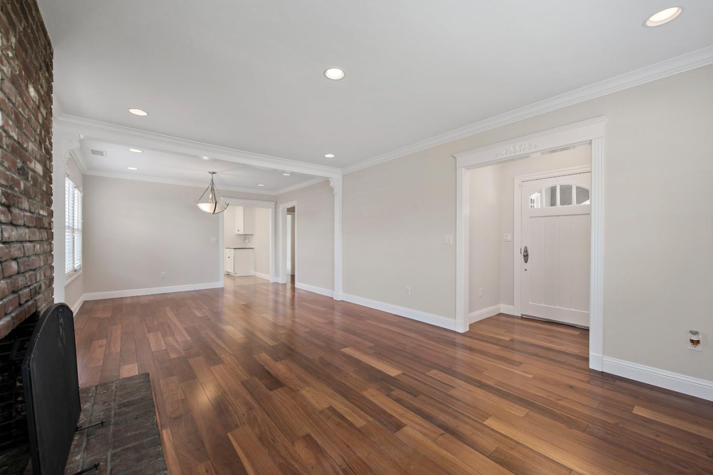 682 Second Avenue Redwood City, CA 94063 - Photo 4 of 18 a view of an empty room with wooden floor