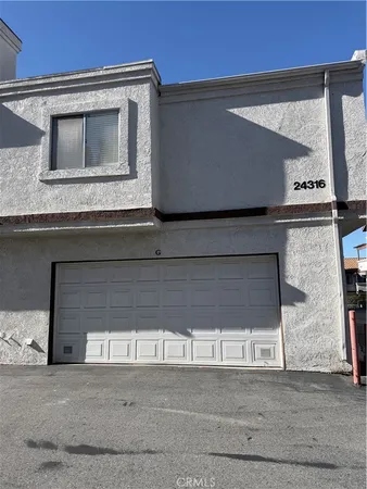 a kitchen with a sink and a microwave