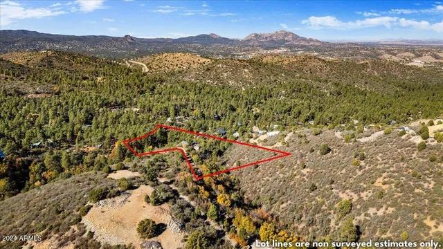 a view of mountain with a lake