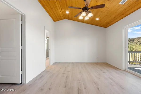 a view of an empty walk in closet
