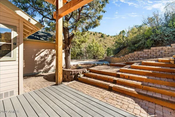 a view of patio with wooden floor