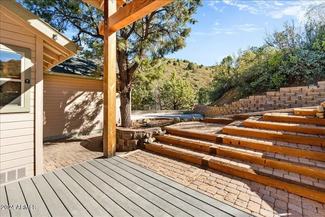 a view of patio with wooden floor