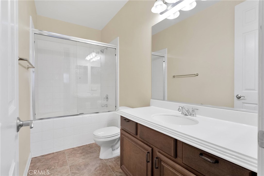 17830 Mana Road Apple Valley, CA 92307 - Photo 31 of 46 a bathroom with a sink a toilet and shower