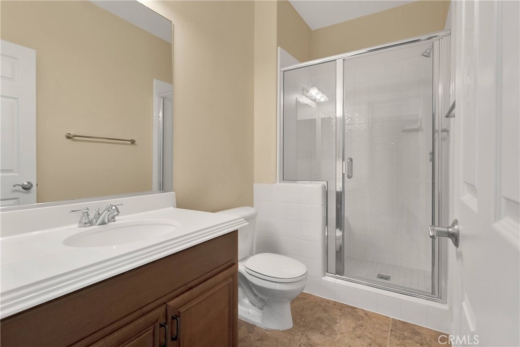 17830 Mana Road Apple Valley, CA 92307 - Photo 36 of 46 a bathroom with a sink a toilet and shower