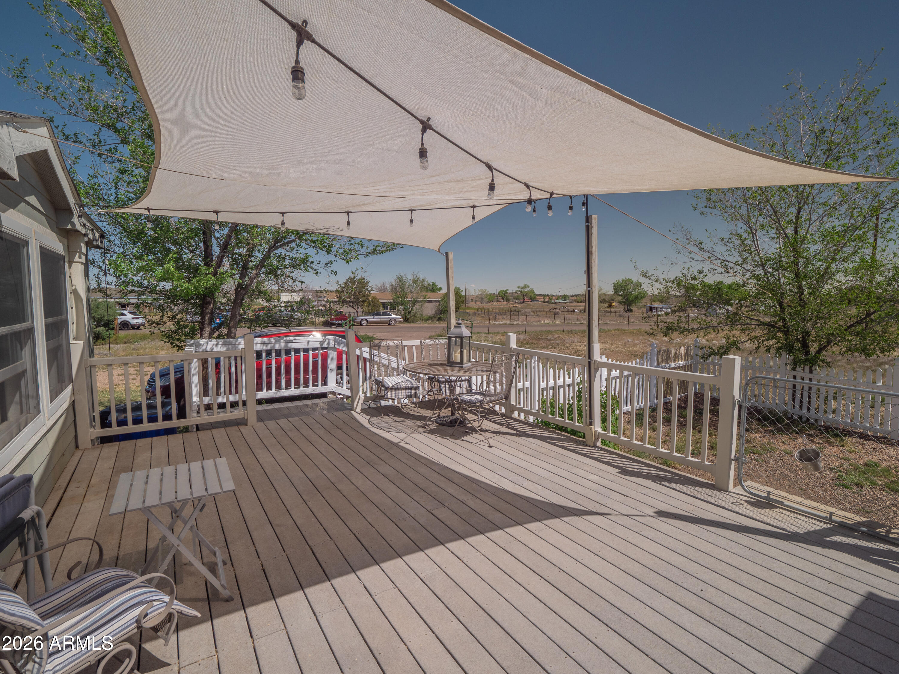 1401 Ranch Road Taylor, AZ 85939 - Photo 11 of 61 a view of a balcony with wooden floor