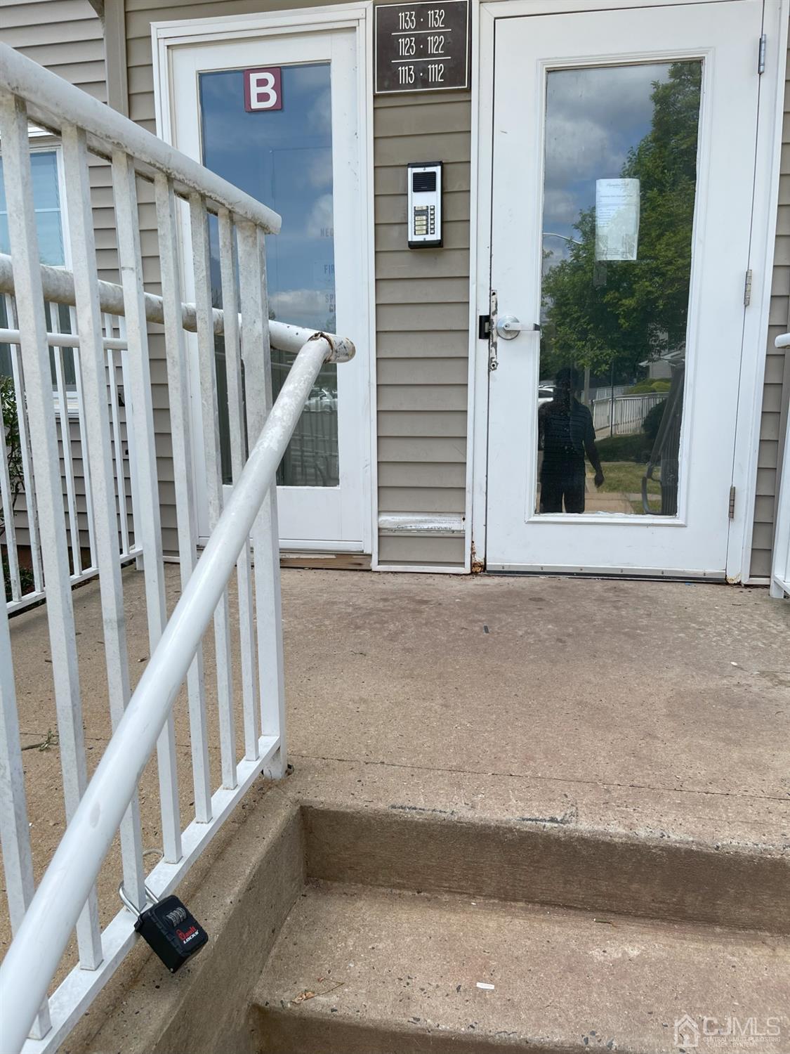 1113 Edpas Road New Brunswick, NJ 08901 - Photo 13 of 13 a view of balcony with wooden floor and stairs