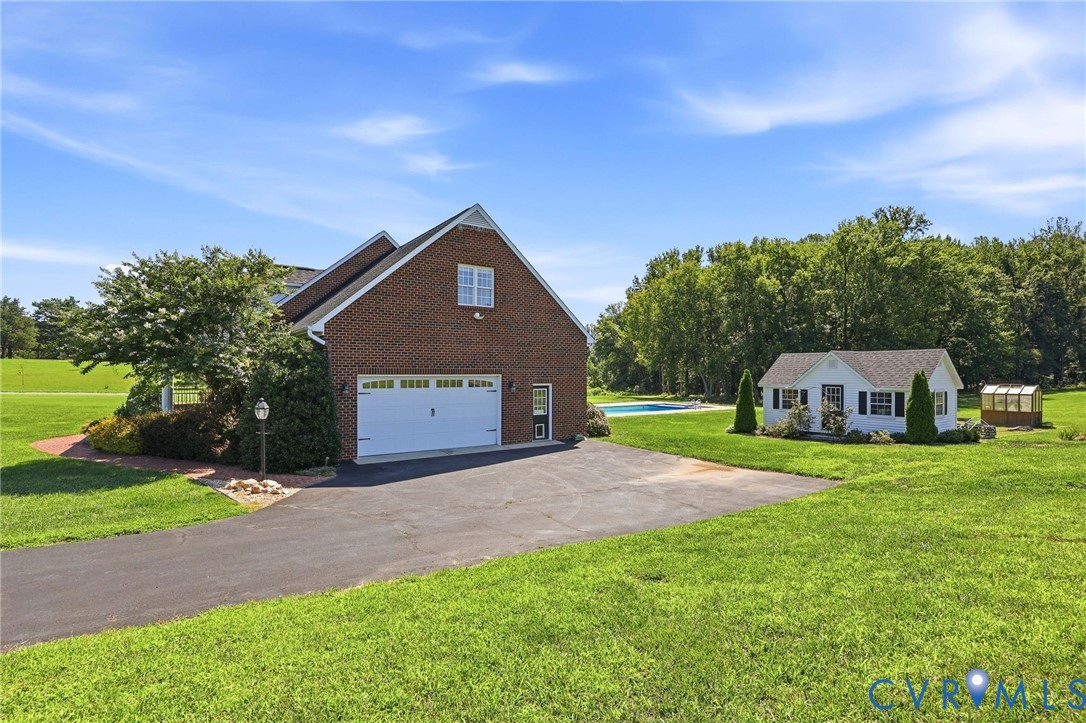 16225 Parrish Farm Road Montpelier, VA 23192 - Photo 52 of 55 Brick facade residence featuring an attached two-c