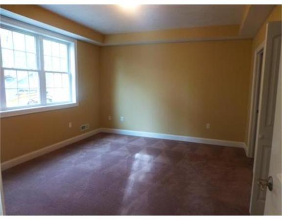 53 Baldwin Road, Unit 1402 Billerica, MA 01821 - Photo 14 of 30 an empty room with a window