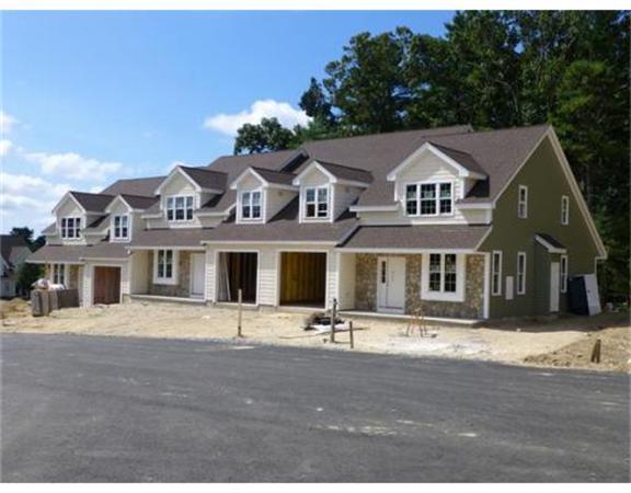 53 Baldwin Road, Unit 1402 Billerica, MA 01821 - Photo 2 of 30 a front view of a house with a garden