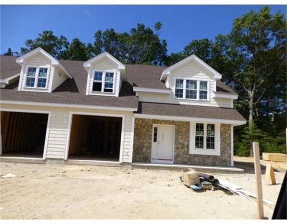 53 Baldwin Road, Unit 1402 Billerica, MA 01821 - Photo 3 of 30 a front view of a house with a yard