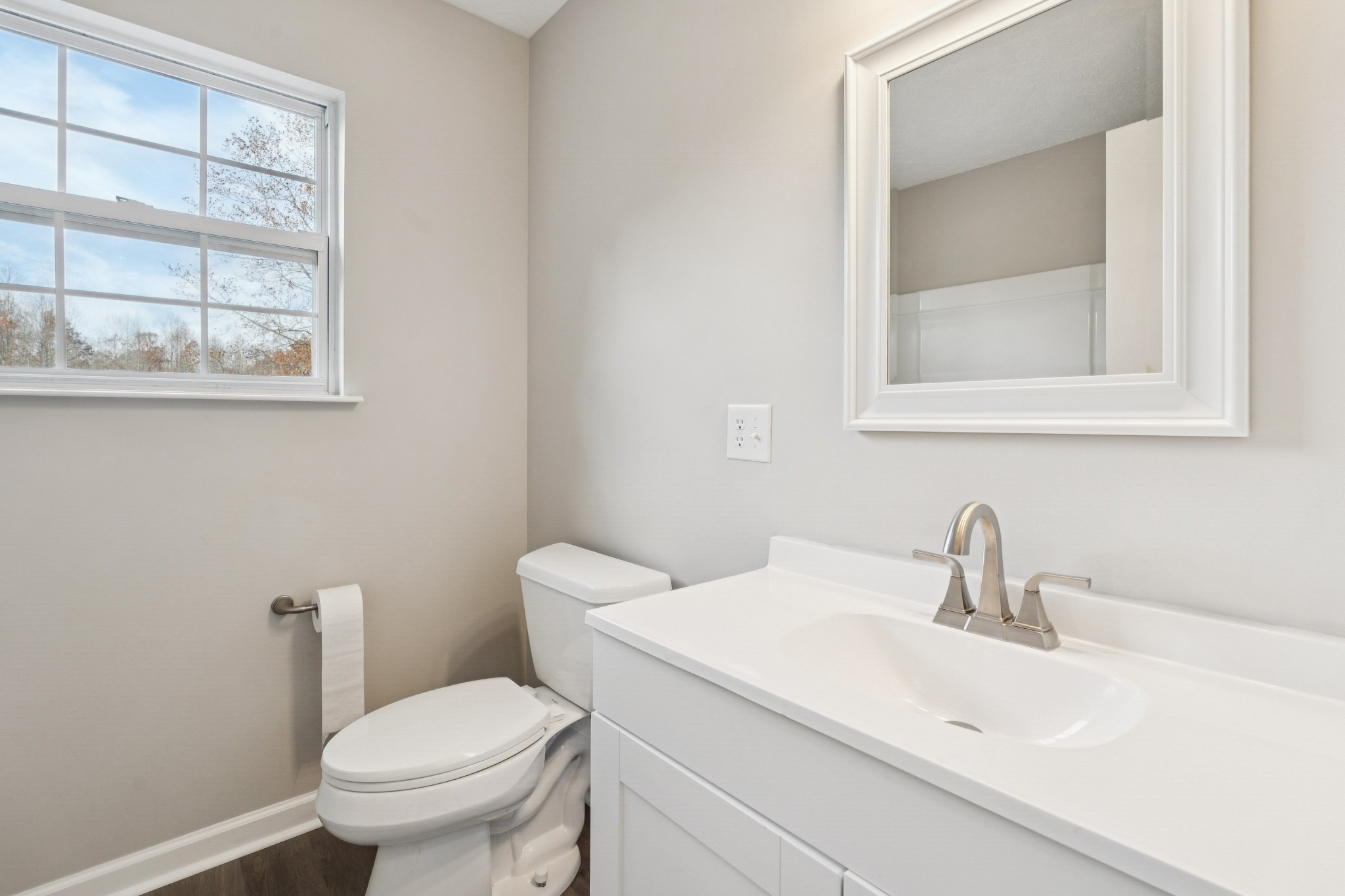 163 Monteagle Falls Road Monteagle, TN 37356 - Photo 19 of 35 a bathroom with a sink and a toilet