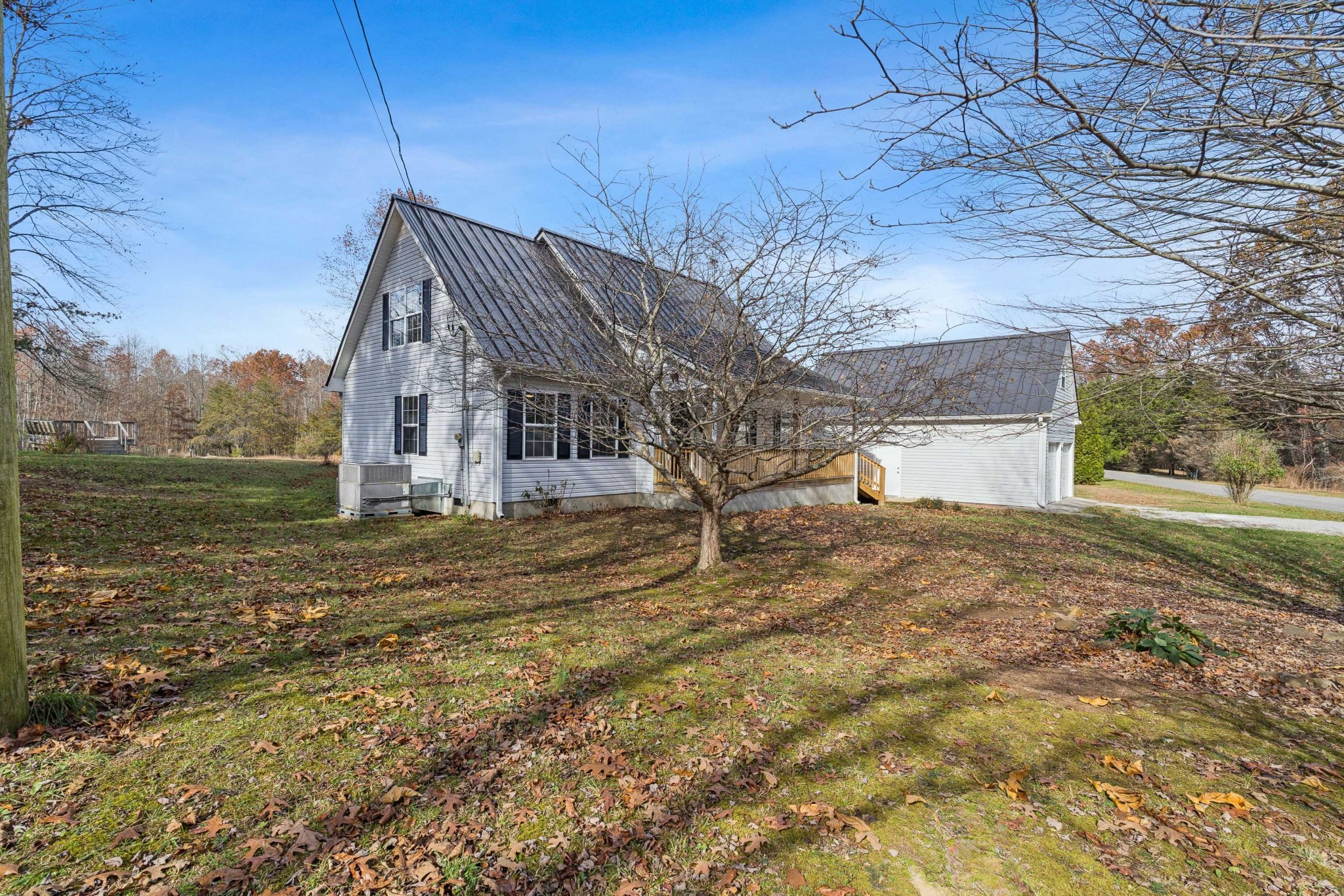 163 Monteagle Falls Road Monteagle, TN 37356 - Photo 25 of 35 a view of a house with a yard