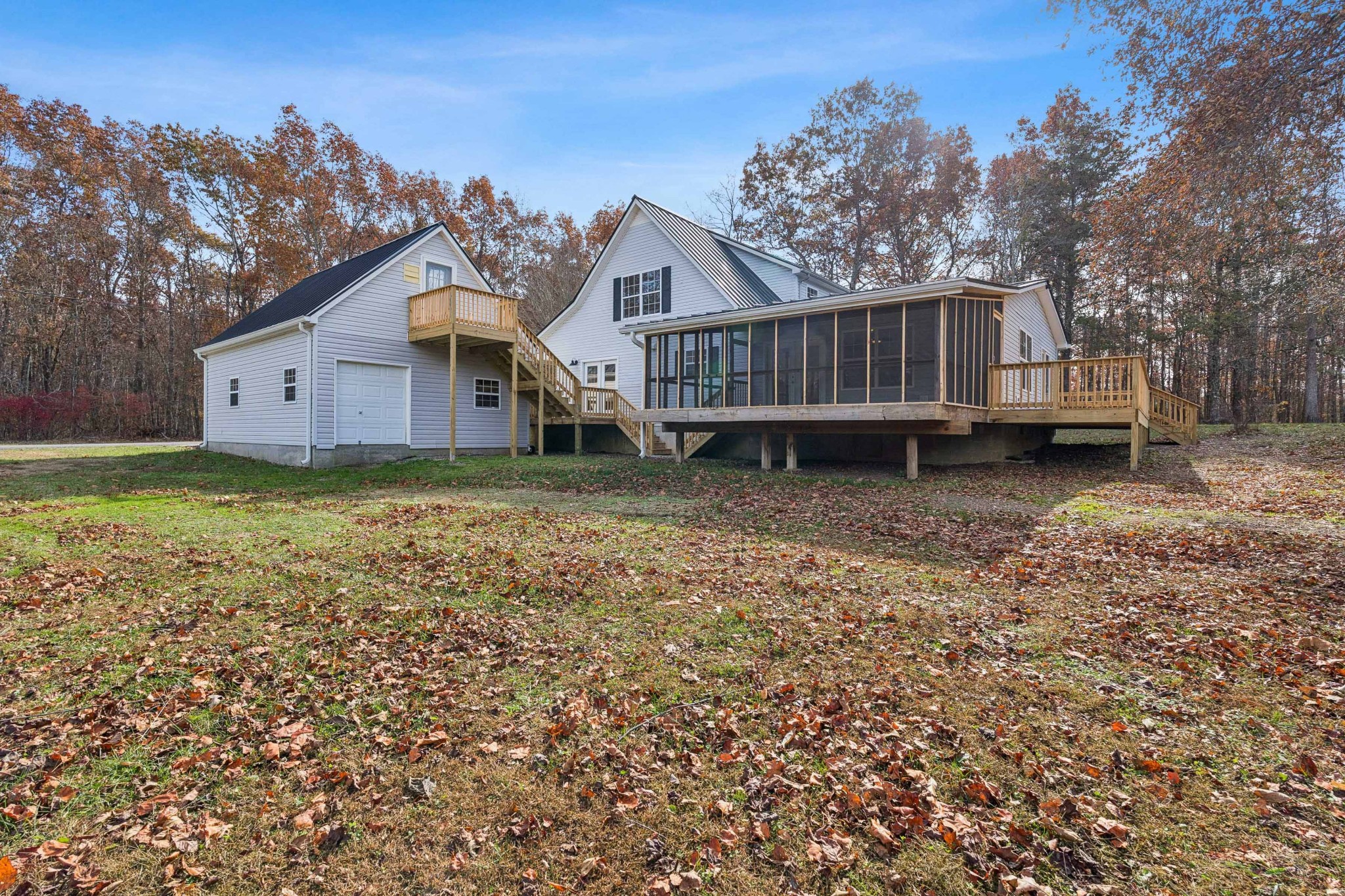 163 Monteagle Falls Road Monteagle, TN 37356 - Photo 26 of 35 a house that has a tree in front of it