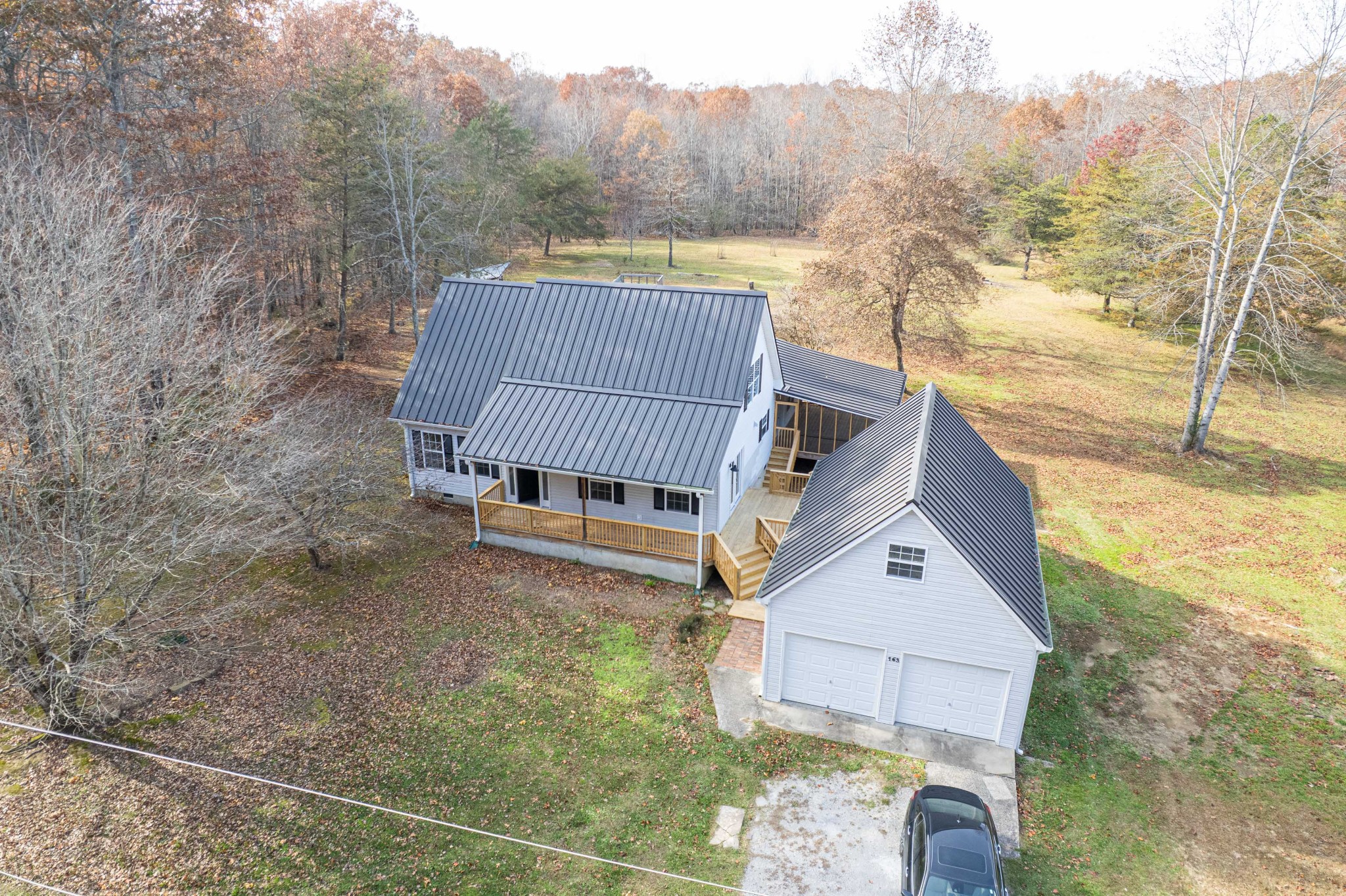 163 Monteagle Falls Road Monteagle, TN 37356 - Photo 28 of 35 a view of a house with a yard