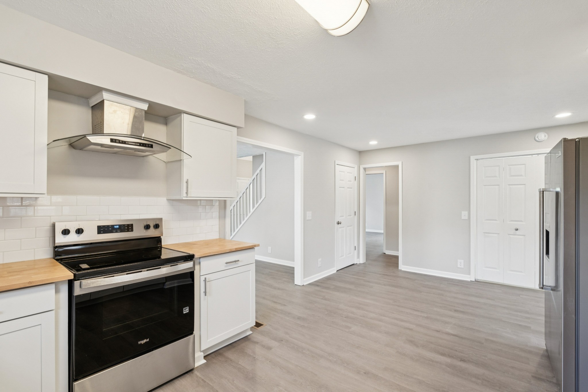 163 Monteagle Falls Road Monteagle, TN 37356 - Photo 6 of 35 a kitchen with a stove and a refrigerator