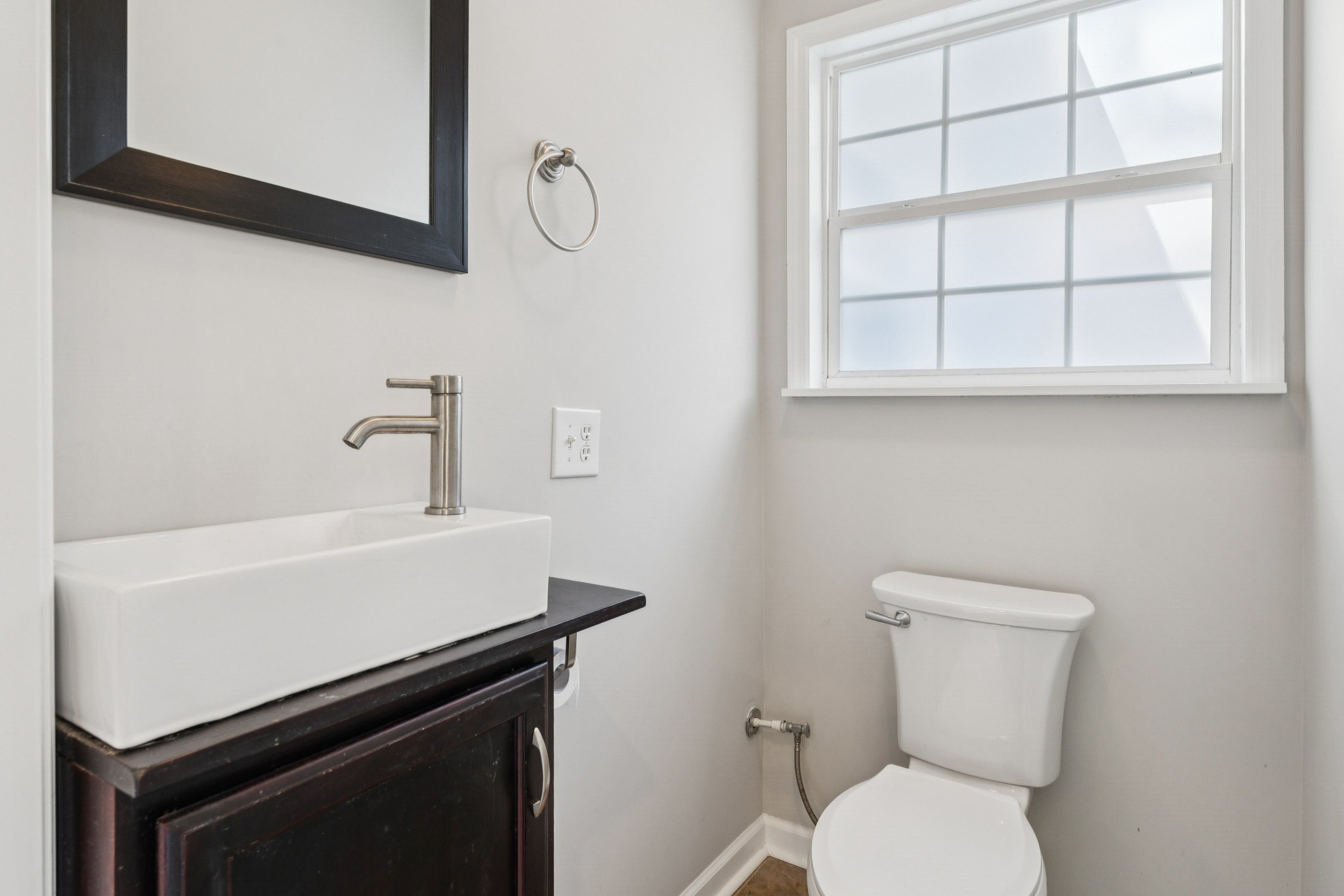 163 Monteagle Falls Road Monteagle, TN 37356 - Photo 10 of 35 a bathroom with a toilet a sink and a window