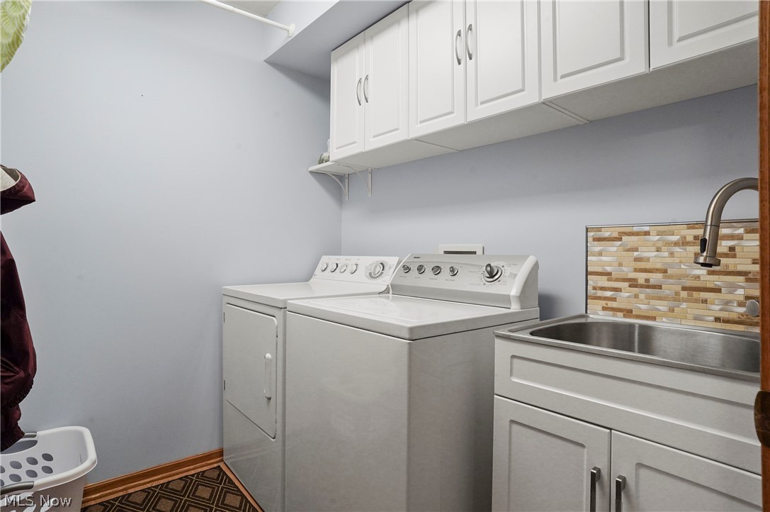 1825 New Milford Road Atwater, OH 44201 - Photo 18 of 34 First floor laundry with lots of storage.