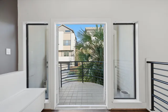a view of front door and bedroom
