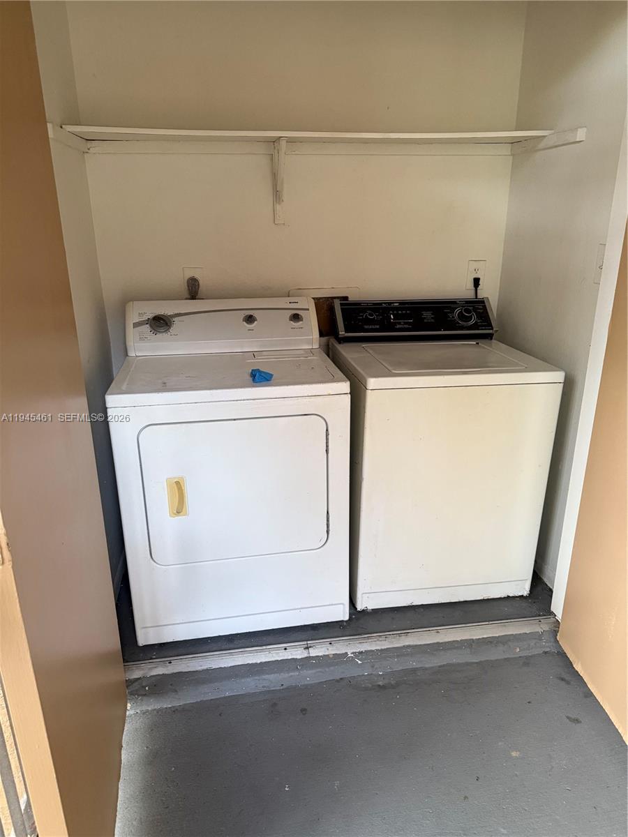 10441 Southwest 156th Court, Unit 429 Miami, FL 33196 - Photo 12 of 17 a utility room with dryer and washer