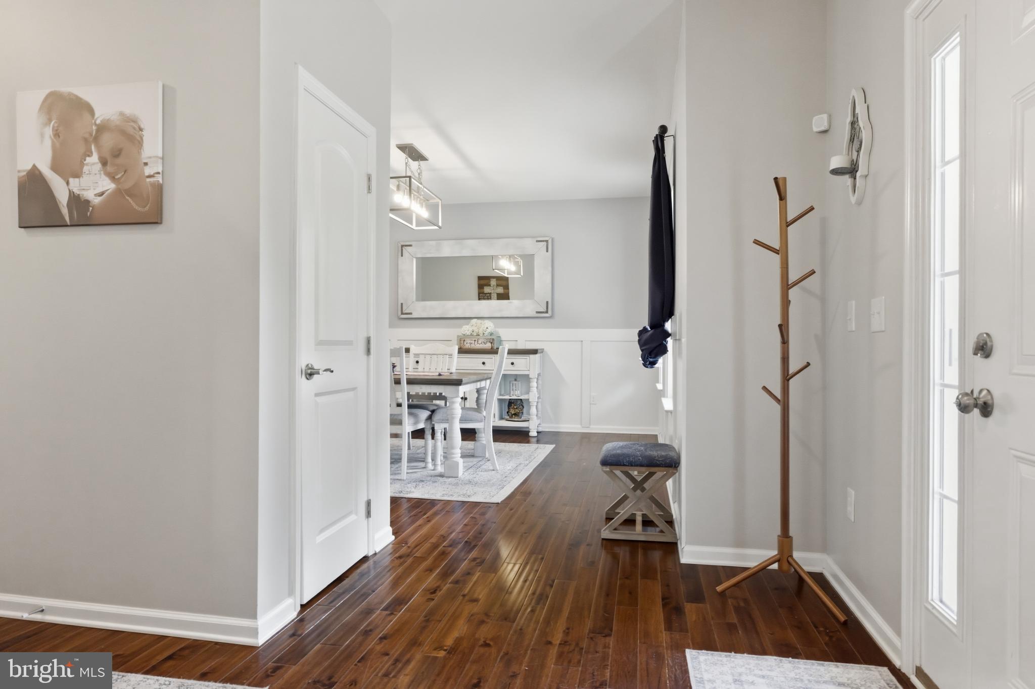 6324 Vint Hill Road Warrenton, VA 20187 - Photo 20 of 103 a view of a livingroom with furniture and wooden floor