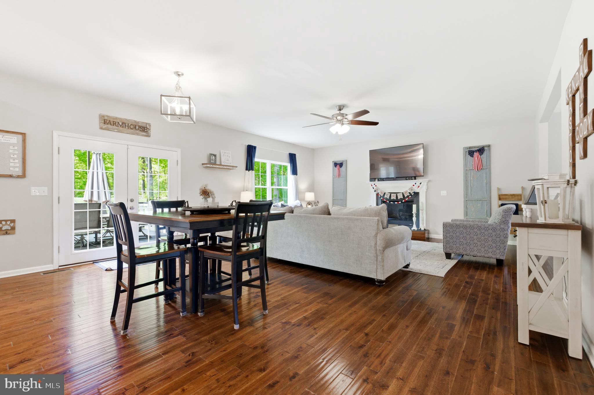 6324 Vint Hill Road Warrenton, VA 20187 - Photo 25 of 103 a living room with furniture and wooden floor