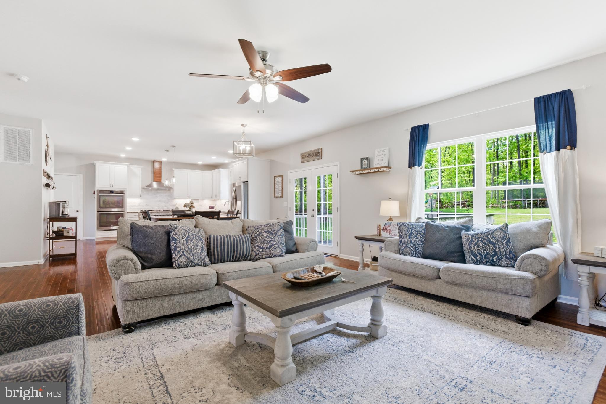 6324 Vint Hill Road Warrenton, VA 20187 - Photo 28 of 103 a living room with furniture and a large window