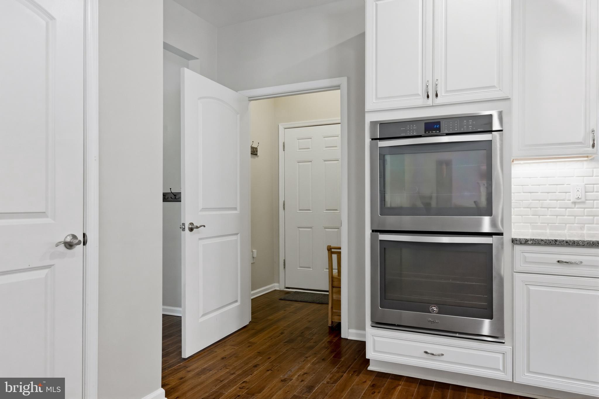 6324 Vint Hill Road Warrenton, VA 20187 - Photo 39 of 103 a kitchen with granite countertop cabinets and steel stainless steel appliances