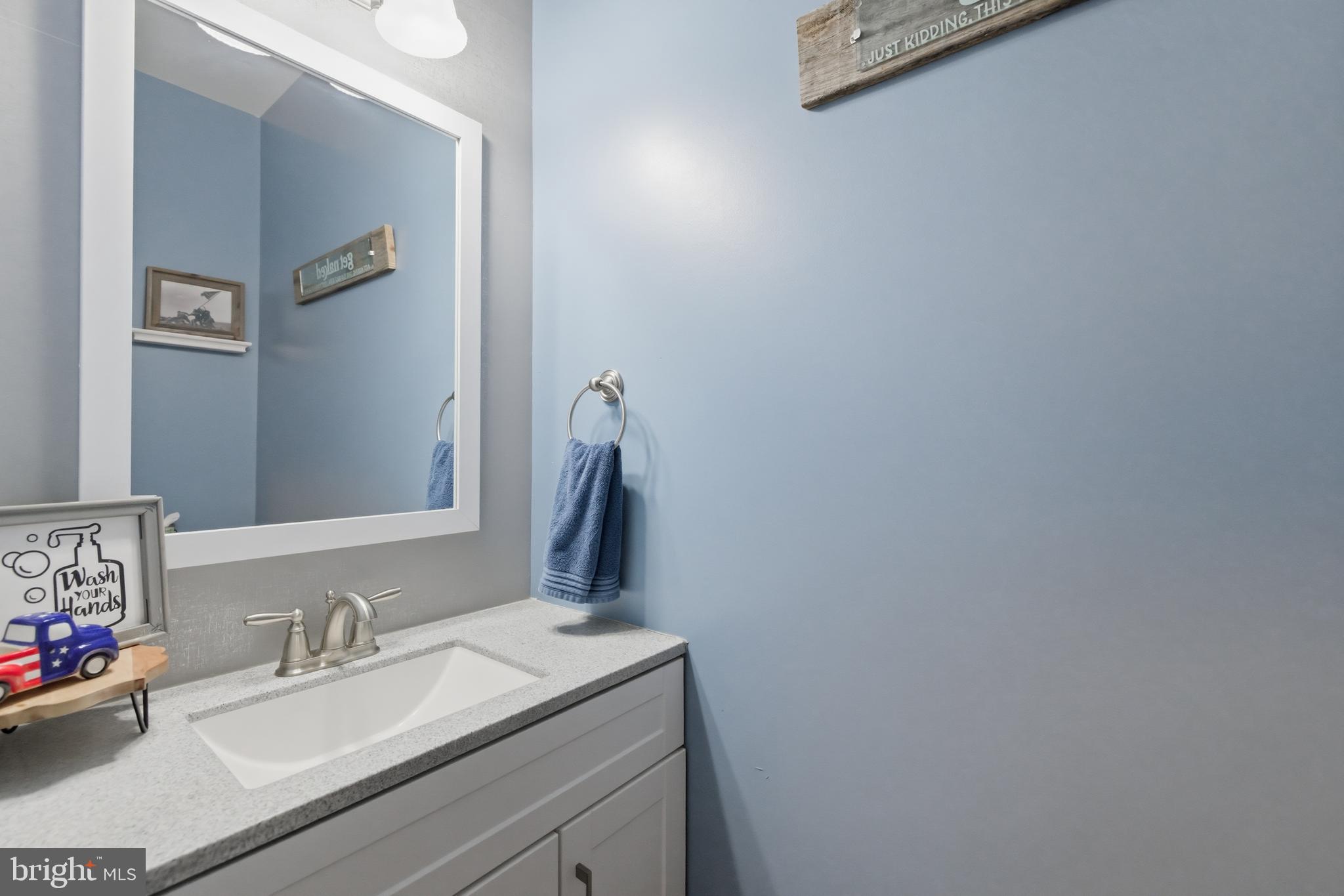 6324 Vint Hill Road Warrenton, VA 20187 - Photo 43 of 103 a bathroom with a sink vanity and a mirror