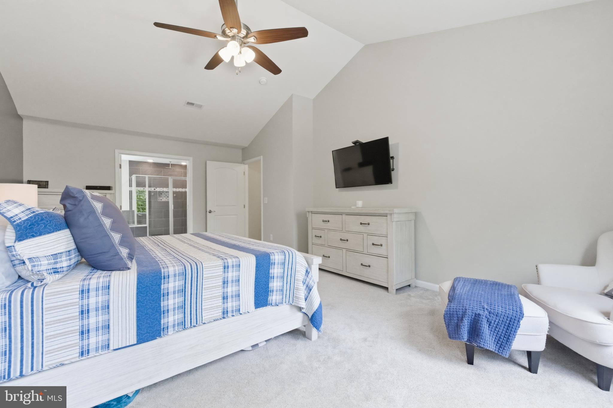 6324 Vint Hill Road Warrenton, VA 20187 - Photo 46 of 103 a bedroom with furniture and a flat screen tv