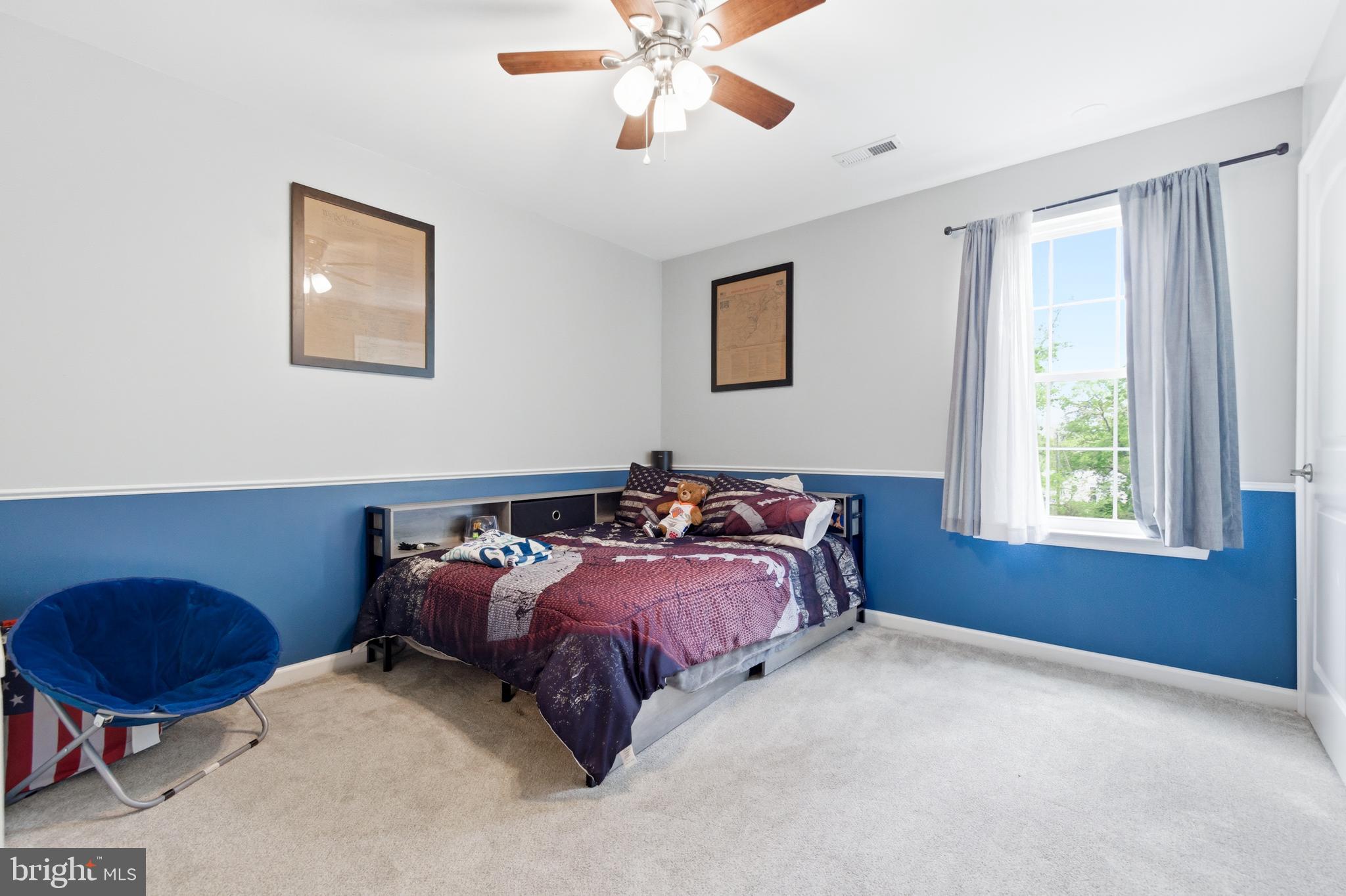 6324 Vint Hill Road Warrenton, VA 20187 - Photo 63 of 103 a bed room with furniture and a window
