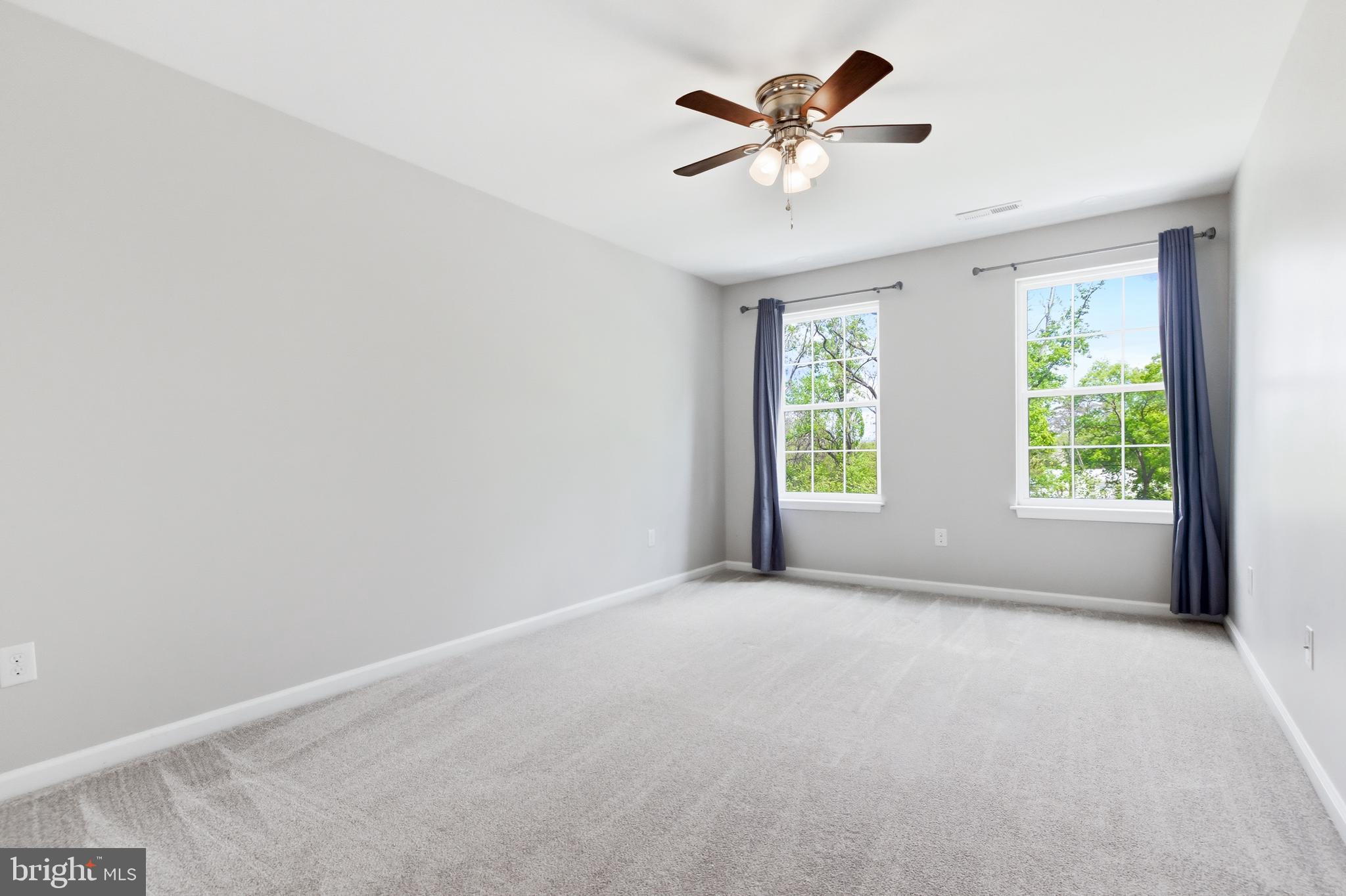 6324 Vint Hill Road Warrenton, VA 20187 - Photo 67 of 103 wooden floor in an empty room with a window