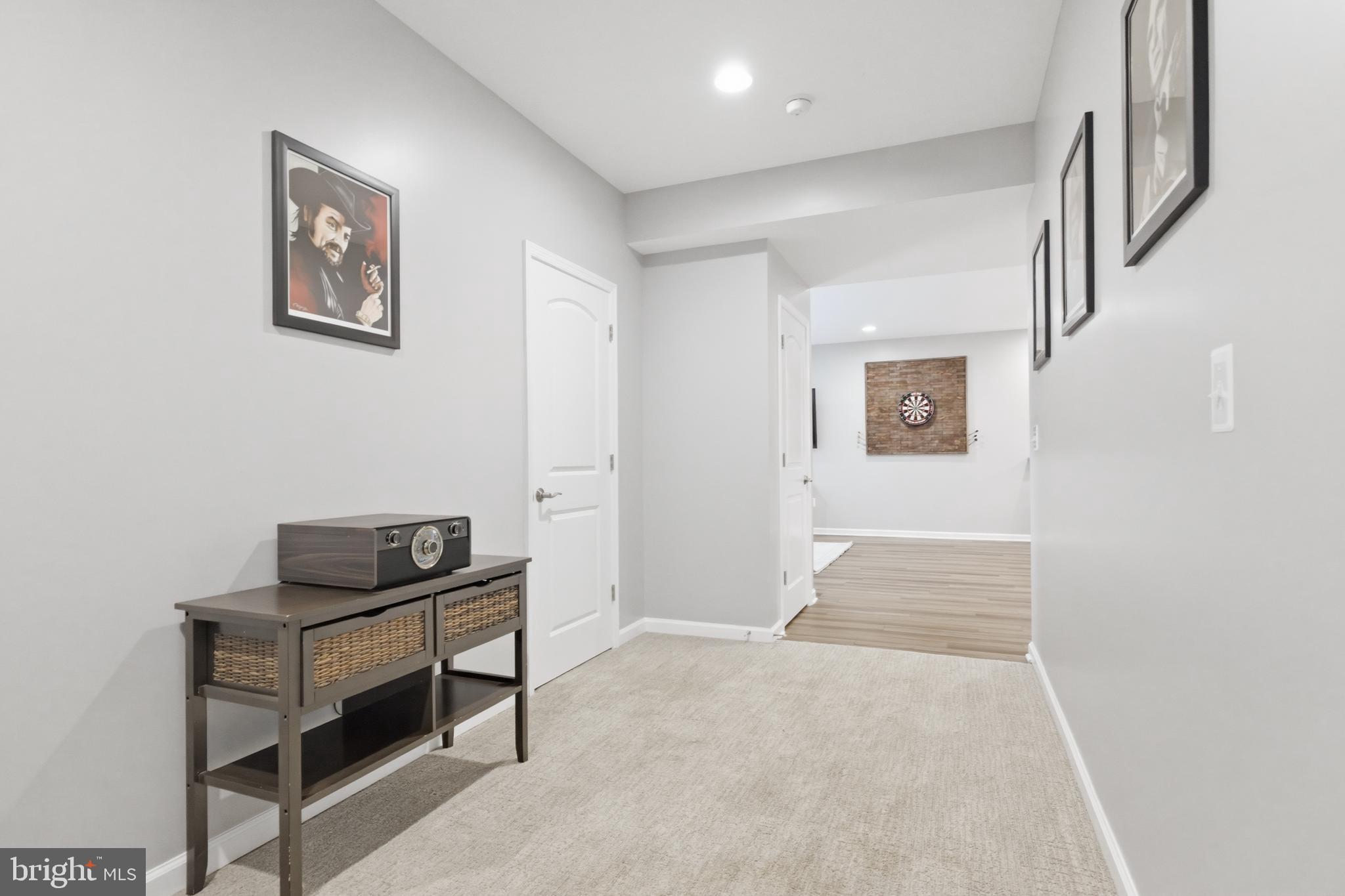 6324 Vint Hill Road Warrenton, VA 20187 - Photo 76 of 103 a hallway with front door and wooden floor