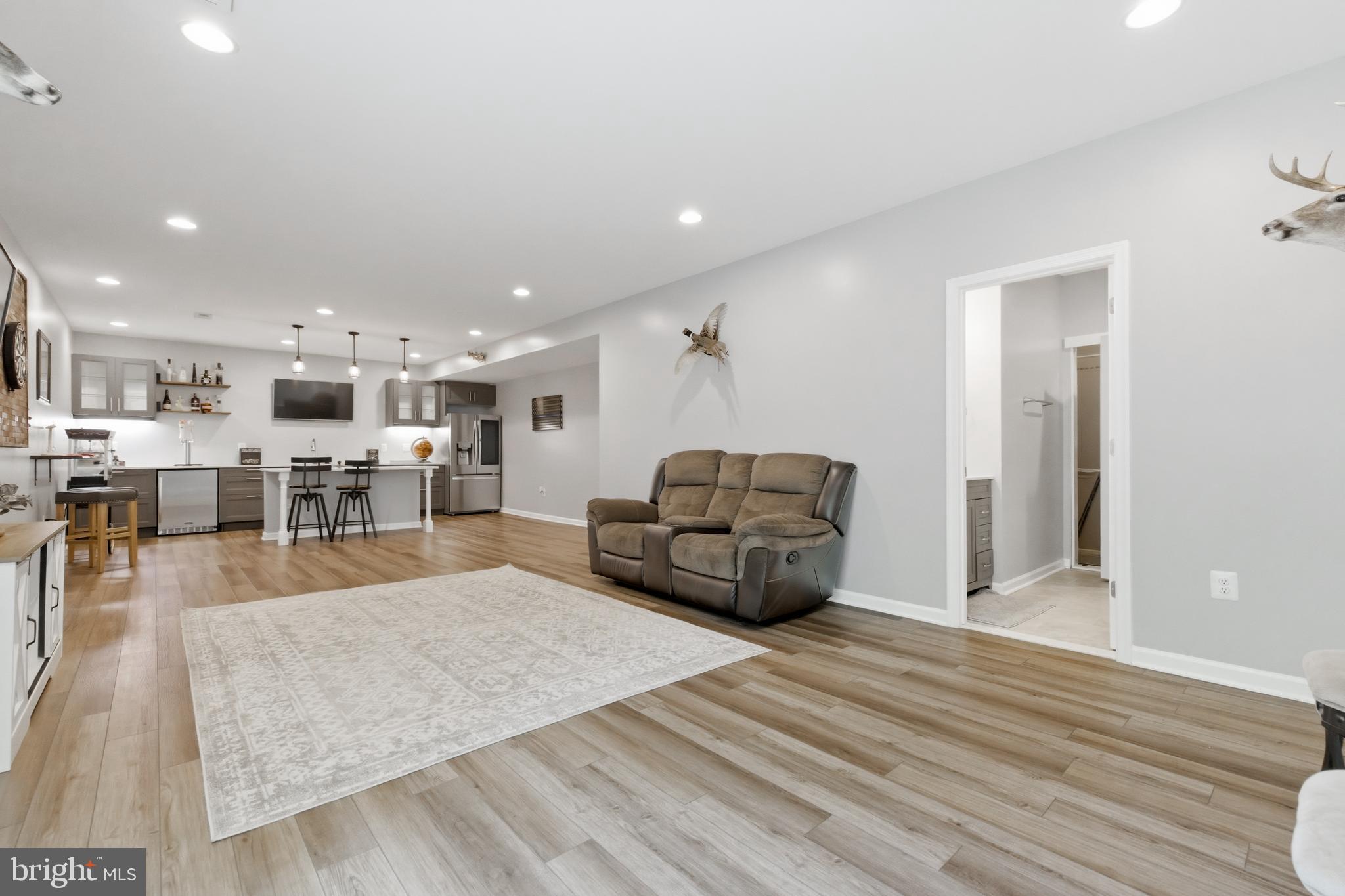 6324 Vint Hill Road Warrenton, VA 20187 - Photo 79 of 103 a living room with furniture and a table