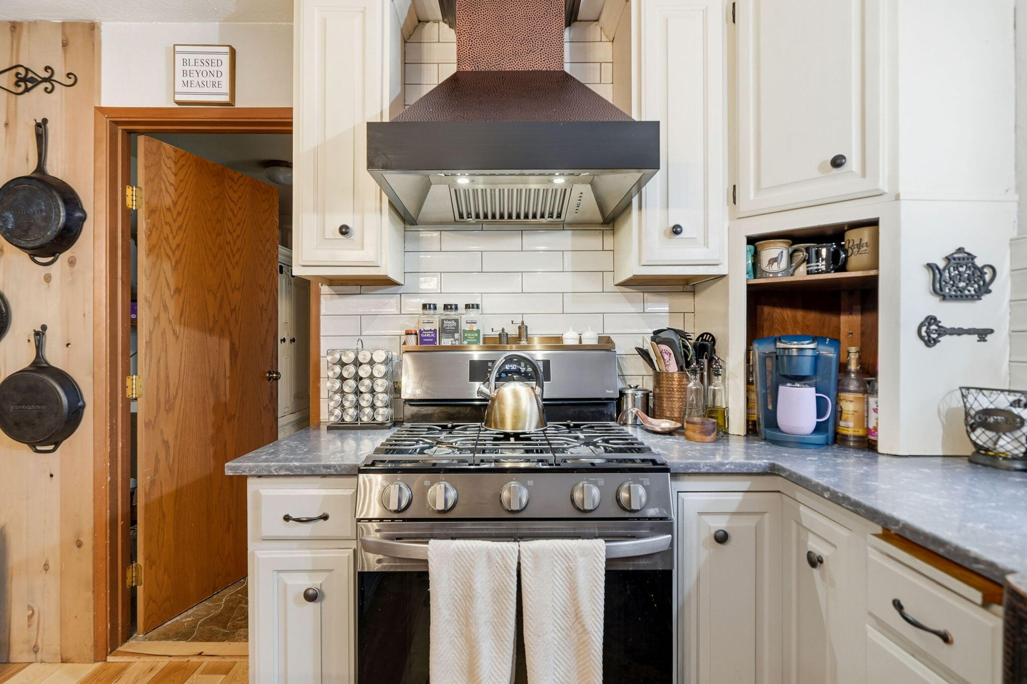 7758 Hidden Meadows Road Shingletown, CA 96088 - Photo 15 of 63 a kitchen with stainless steel appliances granite countertop a stove and a refrigerator