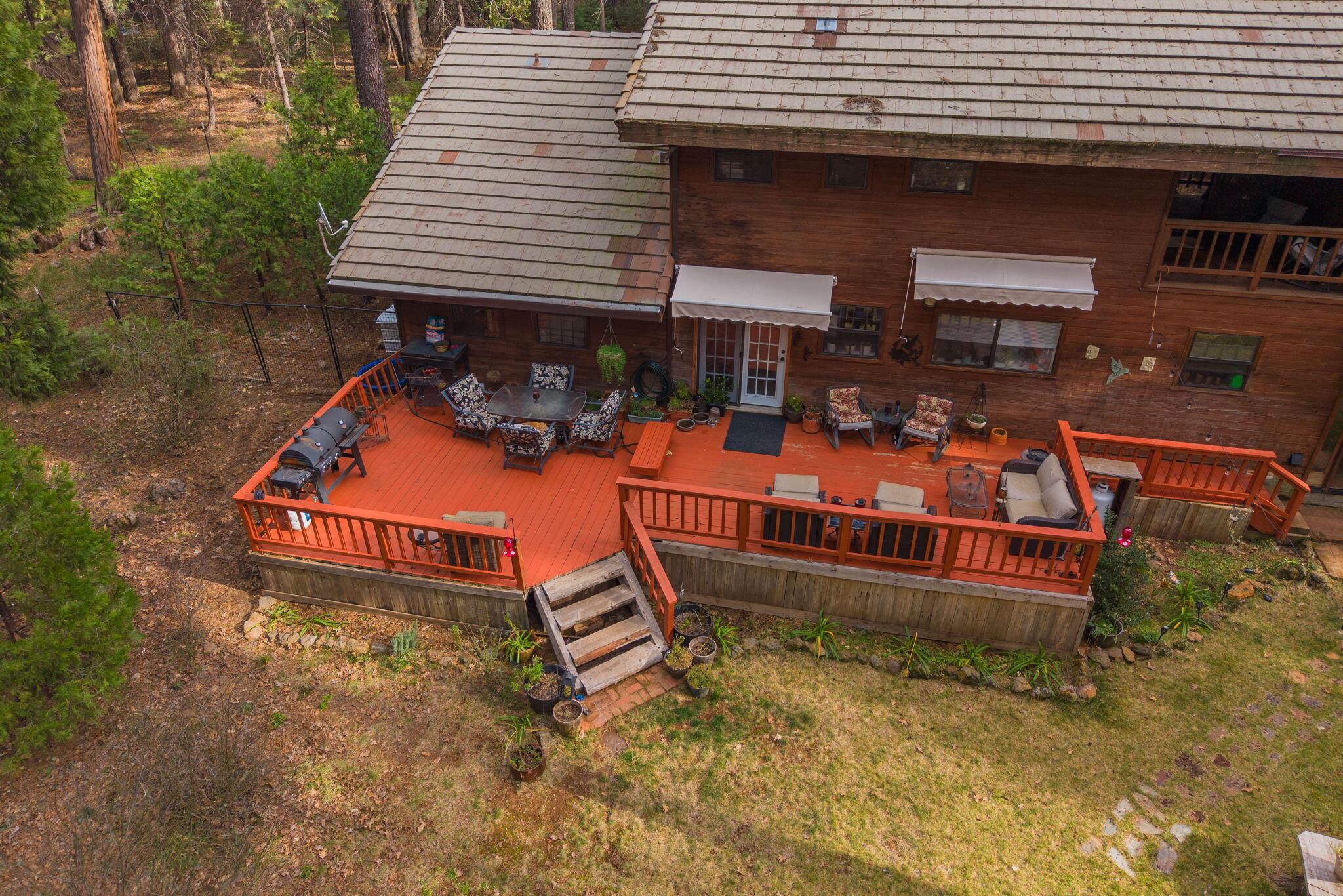 7758 Hidden Meadows Road Shingletown, CA 96088 - Photo 40 of 63 an aerial view of a house with swimming pool and a yard